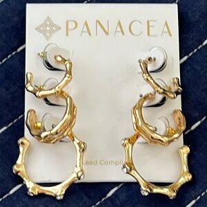 Three pairs of different gold colored bamboo hoops. New with tags.